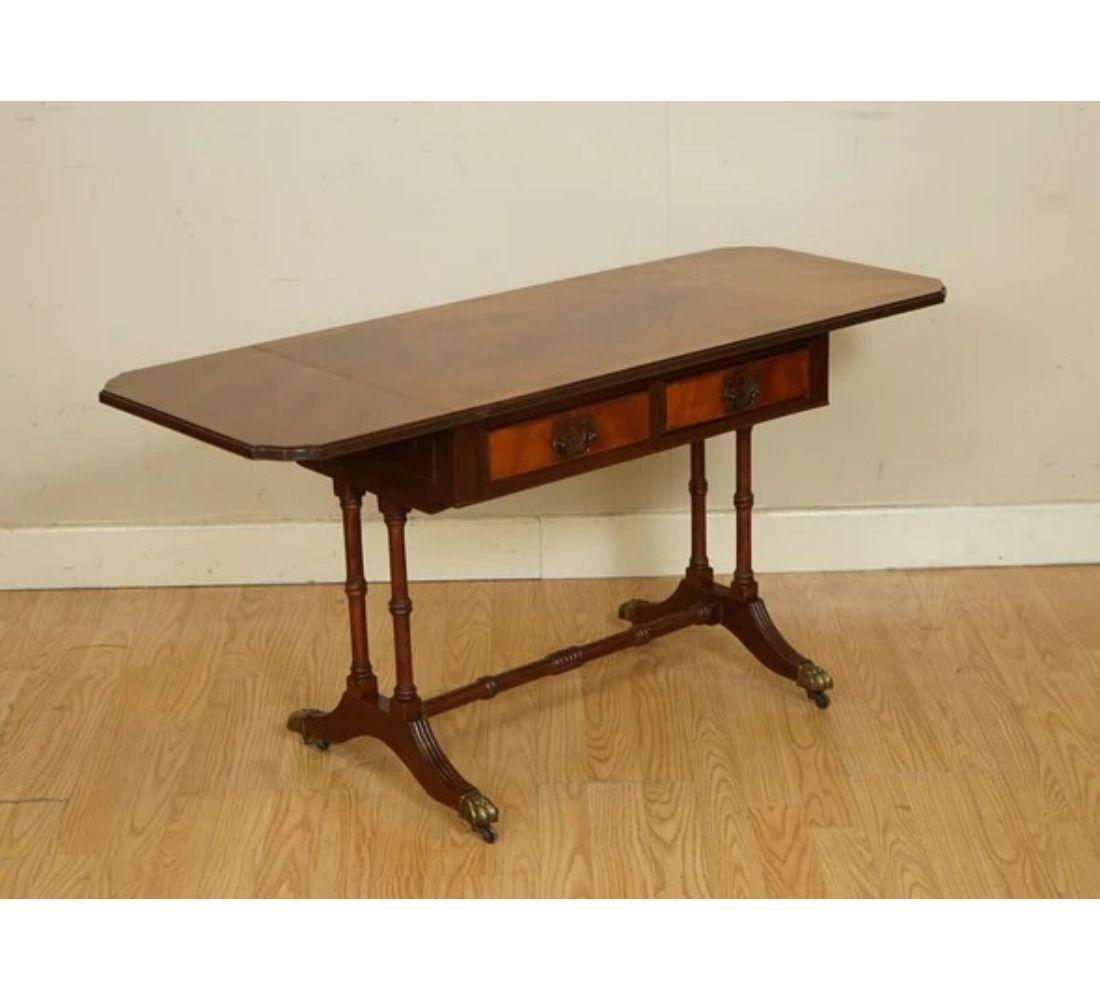 We are delighted to offer for sale this lovely Vintage flamed hardwood drop leaf table.

A charming and solid piece, the top is slightly discolored on one side of the tabletop, however, we think that this adds to its character.

We have lightly