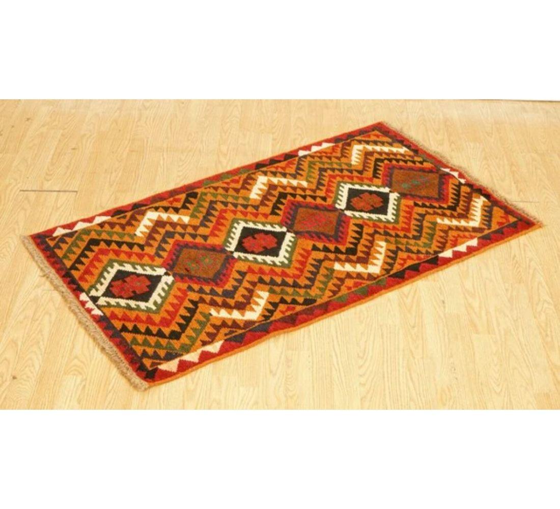 We are delighted to offer for sale this lovely Vintage Handwoven Geometric Kilim rug.

Dimensions: 142 W x 80 D cm.

Please carefully look at the pictures to see the condition before purchasing, as they form part of the description.