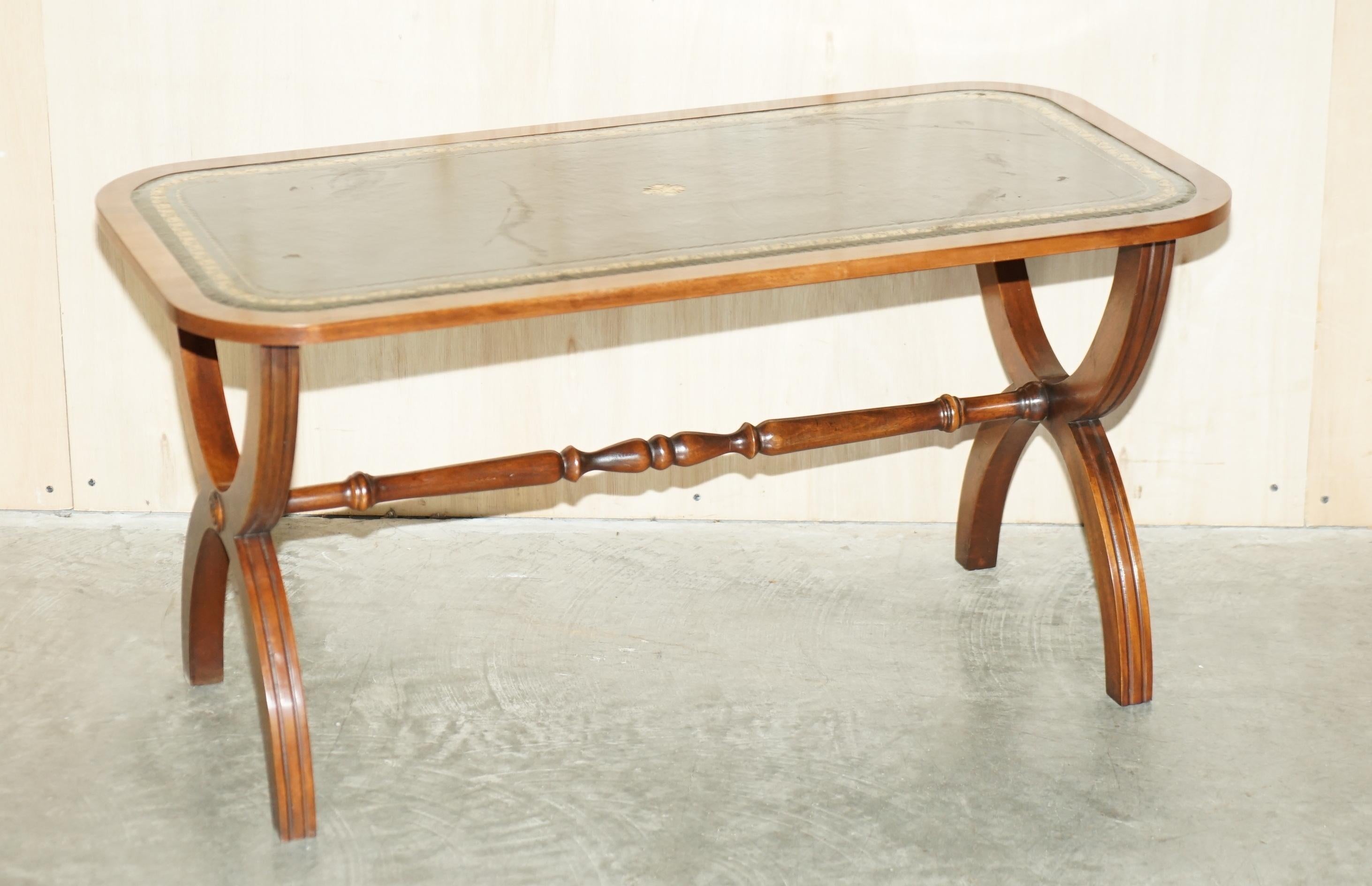 We are delighted to offer this vintage collectable Bevan Funnell medium sized coffee table with nice, gold leaf embossed, green leather top

This piece was made by that great staple of British furniture makers, Bevan Funnell, their pieces have