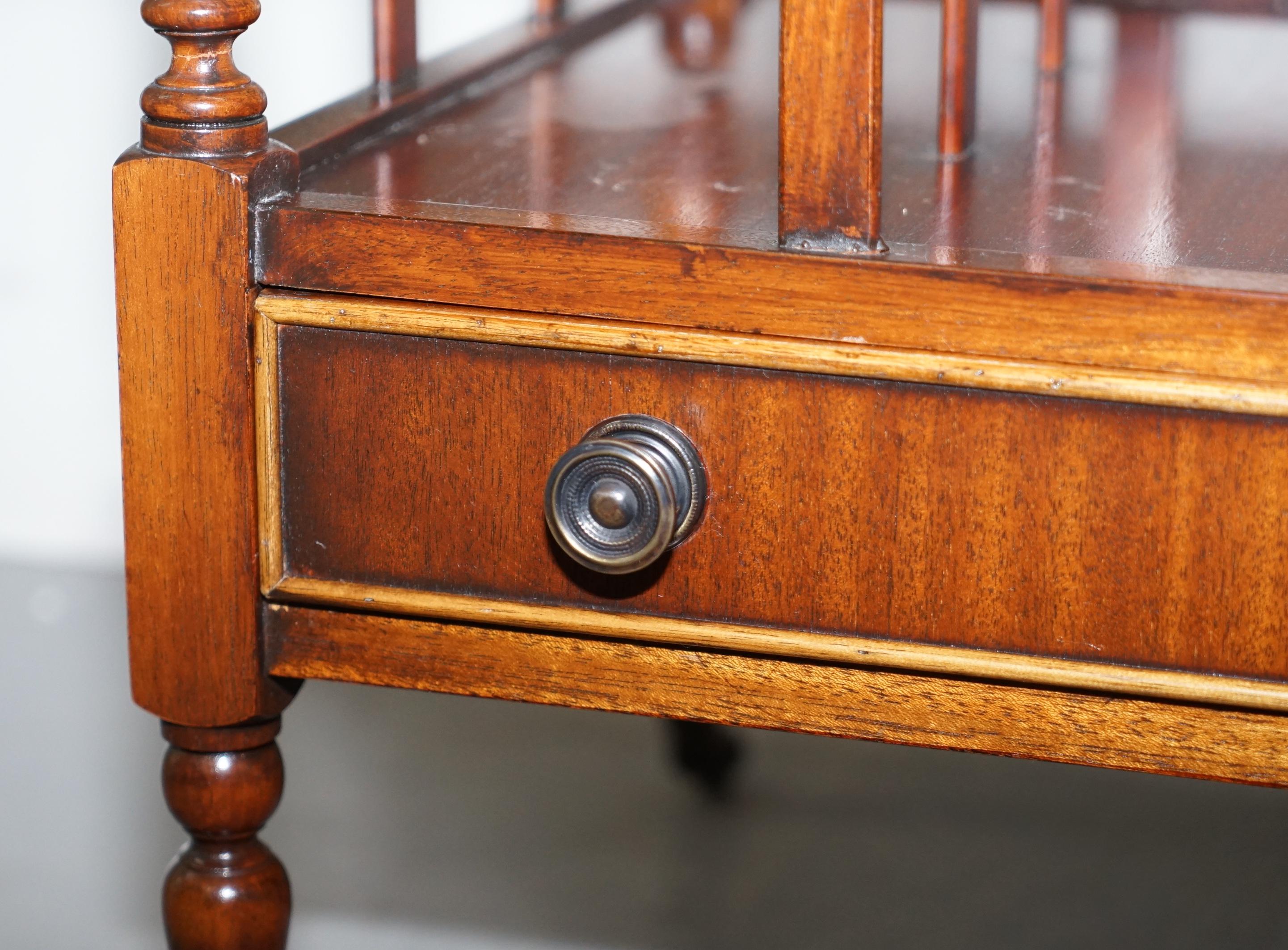 Lovely Vintage Hardwood Magazine Rack with Castors and Single Drawer Whatnot For Sale 4