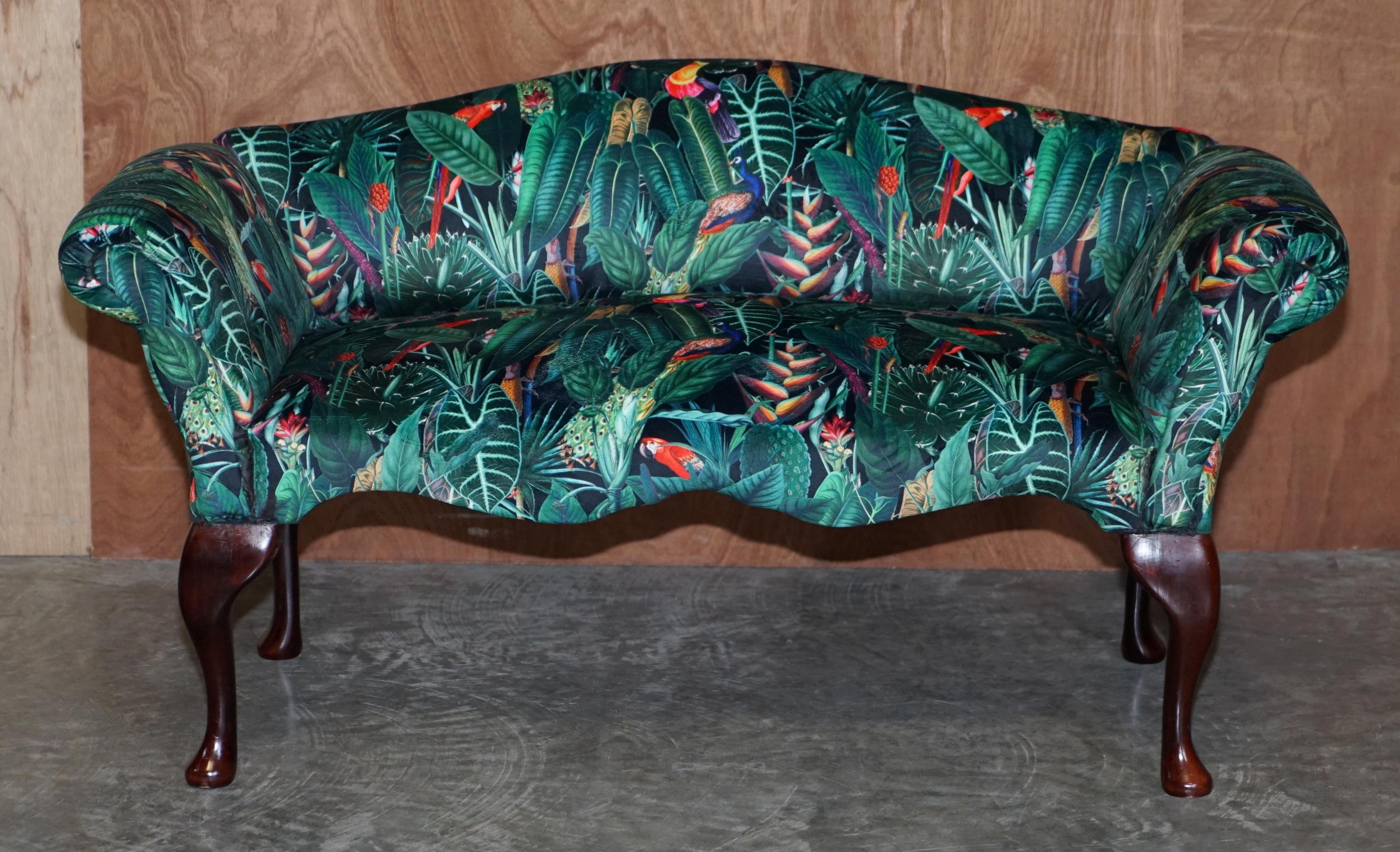 We are delighted to offer for sale this lovely vintage mini sofa window seat which has been reupholstered in Birds of Paradise velvety fabric 

The piece is part of a suite, in total I have a walnut framed carved Italia armchair, an English large