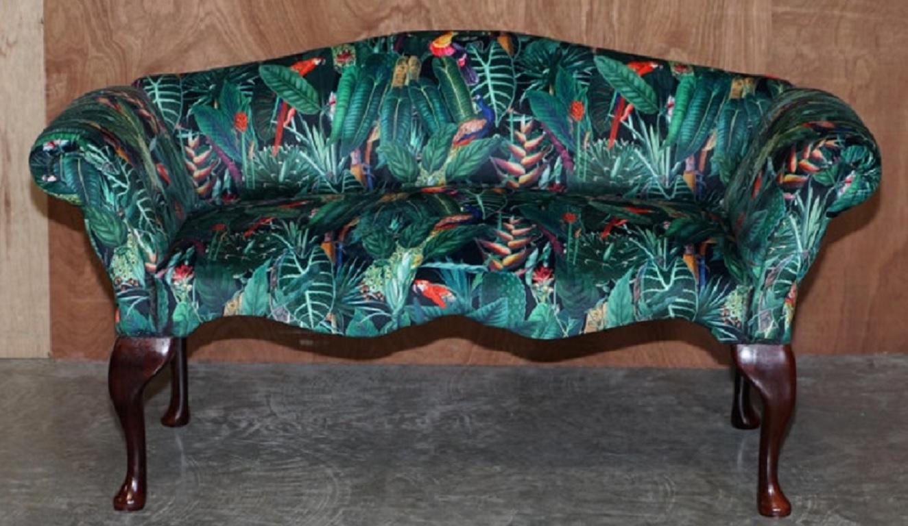 We are delighted to offer for sale this lovely vintage mini sofa window seat which has been reupholstered in Birds of Paradise velvety fabric.

The piece is part of a suite, in total I have a walnut framed carved Italia armchair, an English large