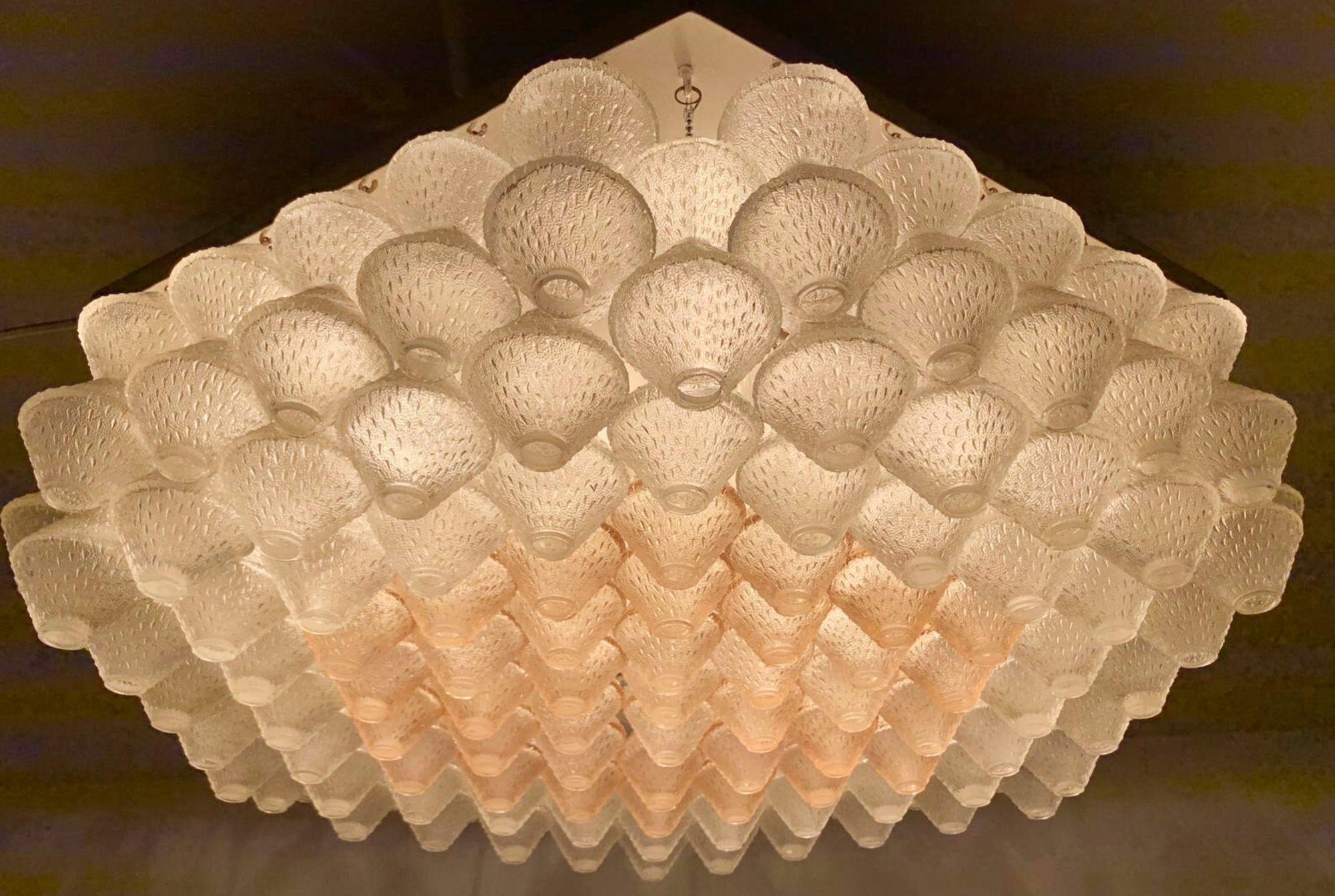 Vintage Italian flush mount with clear and pink textured Murano glass elements suspended on white frame / Made in Italy circa 1960s
Measures: diagonal distance 27.5 inches, side width 16 inches, height 8 inches