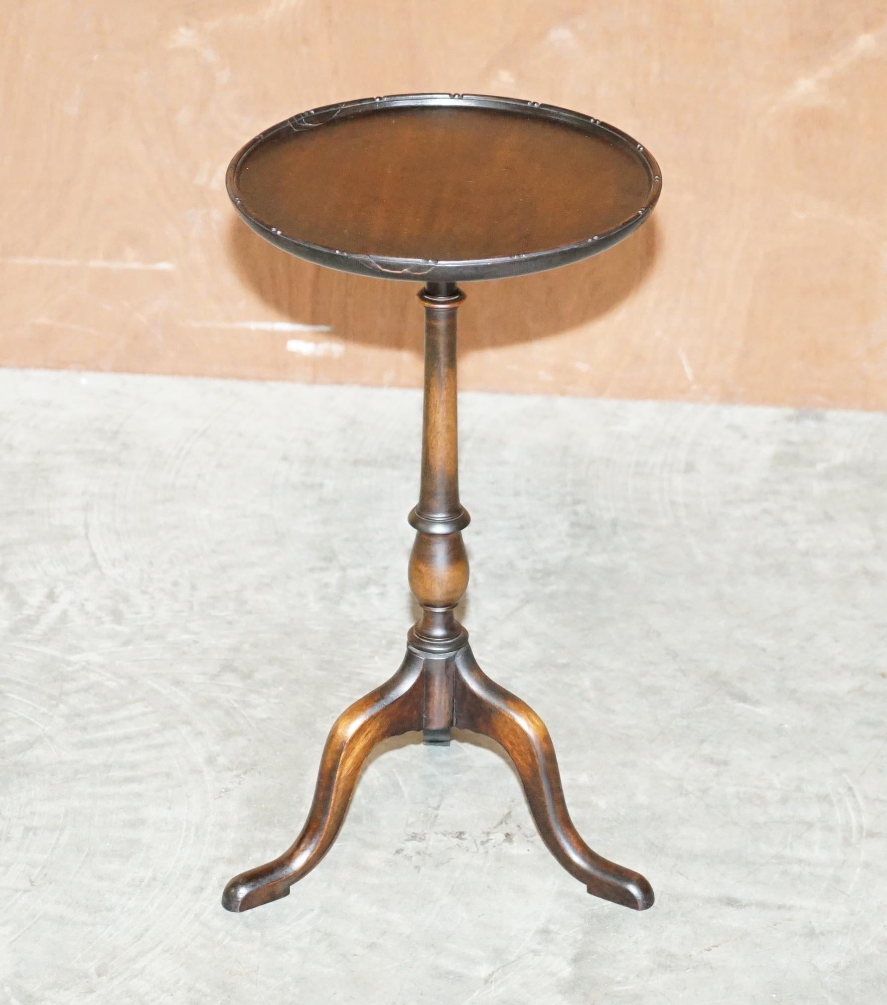 We are delighted to offer for sale this lovely vintage Scottish Mahogany lamp or side table with nicely turned column base and carved top edge.

A good-looking well-made tripod table in good condition throughout, we have cleaned waxed and polished