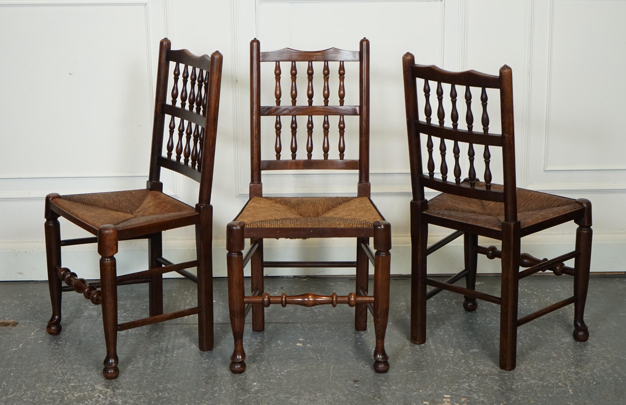 
We are delighted to offer for sale this Set Of 6 Spindle Back Rush Seat Dining Chairs. 

Exudes vintage charm and elegance, perfect for adding a touch of traditional style to your dining room or kitchen. These chairs are crafted with a classic