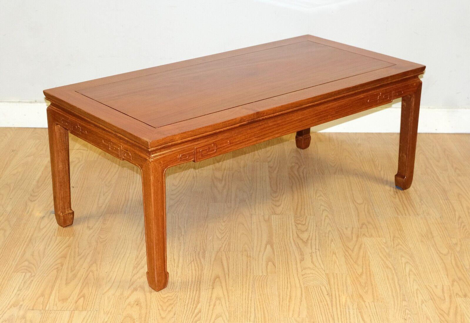 We are delighted to offer for sale this lovely Chinese rosewood coffee table on hoof feet and hand carved details around. 

This well made, simple but elegant coffee table is a great addition to your living room. The item is presented with hand