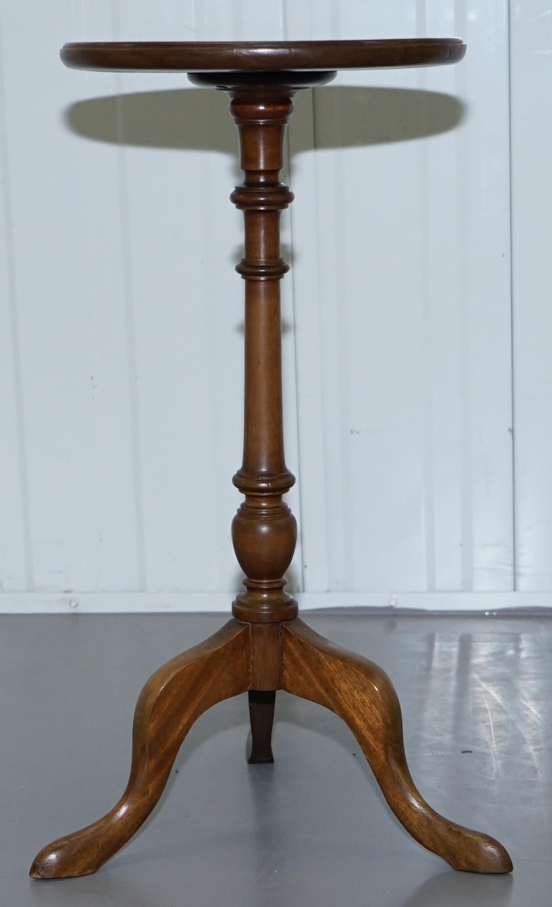 We are delighted to offer for sale this lovely small vintage light Walnut lamp or side table with nicely turned column base

A good looking well made tripod table in good, we have cleaned waxed and polished it from top to bottom, there will be