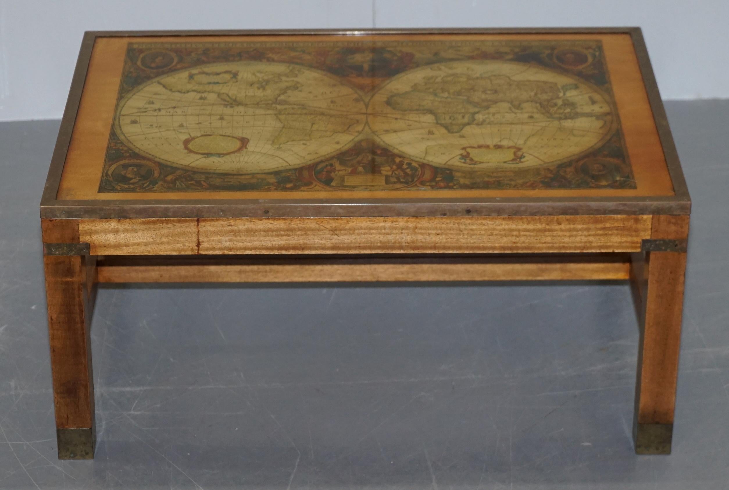 We are delighted to offer for sale this stunning military Campaign table with antique style world map

A very good looking and well made piece, in the military Campaign style with brass fixtures and fittings, the tabletop is thick glass

The