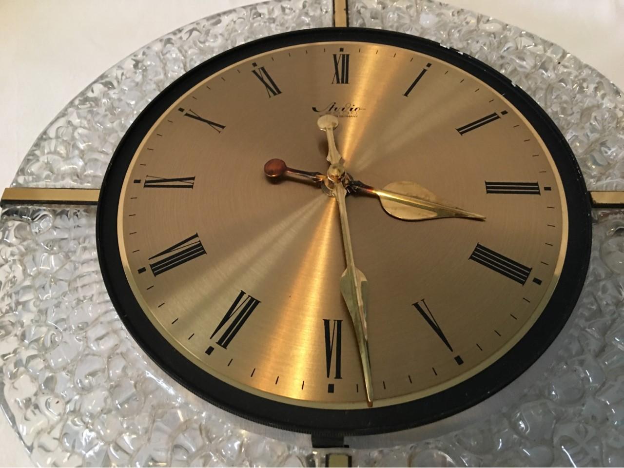Very pretty wall clock surrounded by Bubble Glass. Made in 1960s West Germany. The clock has been professionally cleaned and oiled. Functions perfectly.