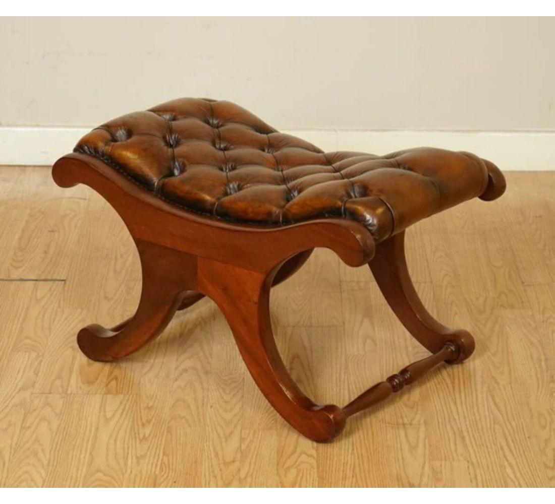 Hand-Crafted Lovely Whiskey Brown Hand Dyed Chesterfield Sadle Curved Footstool For Sale