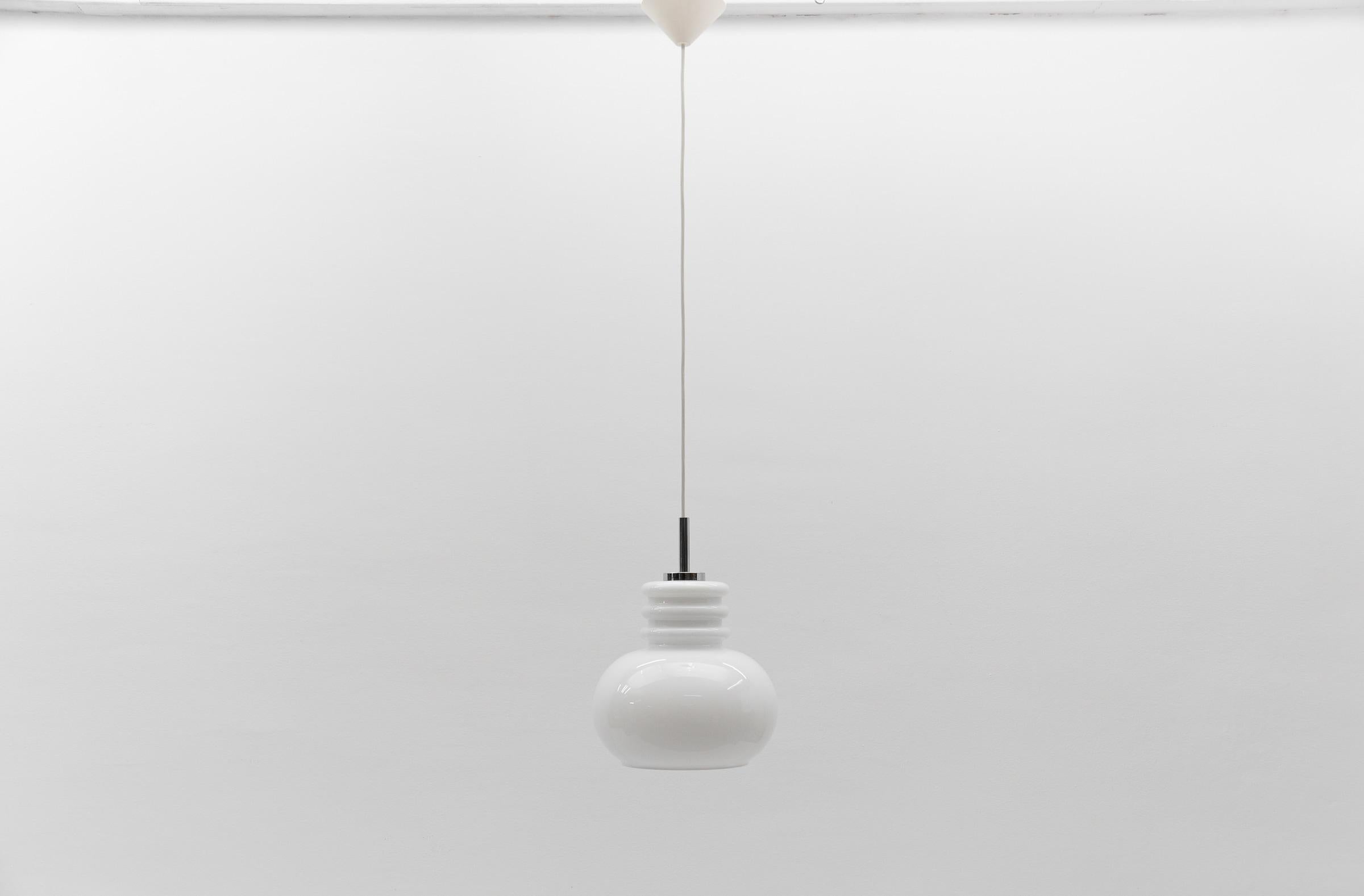 Lovely White Glass Ceiling Lamp by Peill & Putzler, 1960s

The cable length with lamp is 95cm in total, can be adjusted down to 60cm. 

The lamp need 1x E27 / E26 Edison screw fit bulb, is wired, in working condition and runs both on 110 / 230