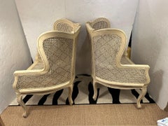 Lovely Wingback French Provincial Double Caned and Carved Wood Bergeres