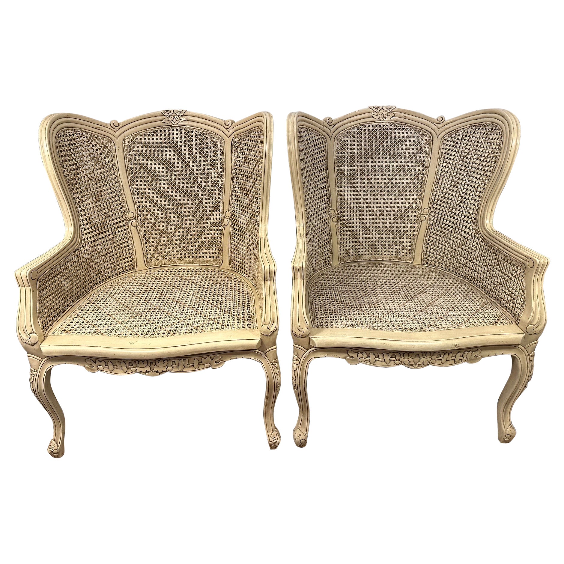Lovely Wingback French Provincial Double Caned and Carved Wood Bergeres