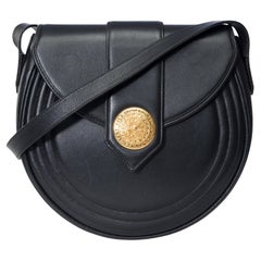 Used Lovely YSL shoulder bag in the shape of a half moon in black leather, GHW