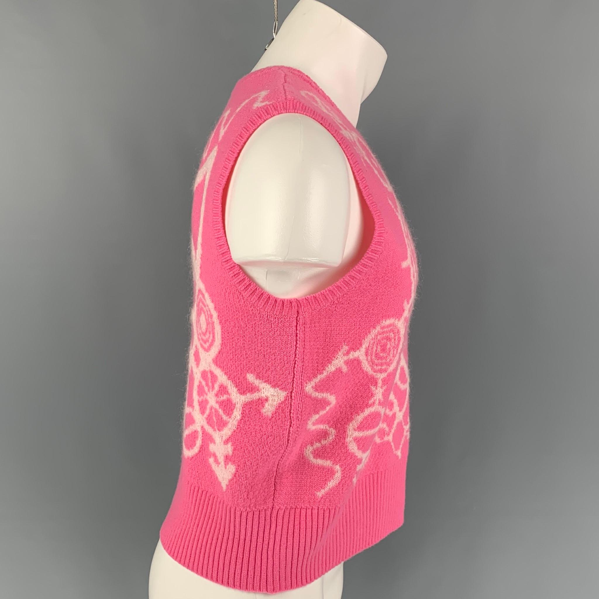 LOVERBOY by CHARLES JEFFREY vest comes in a pink & white merino wool with a front mohair heart design featuring a cropped style and a crew-neck. 

Excellent Pre-Owned Condition.
Marked: M

Measurements:

Shoulder: 15 in.
Chest: 38 in.
Length: 20.5