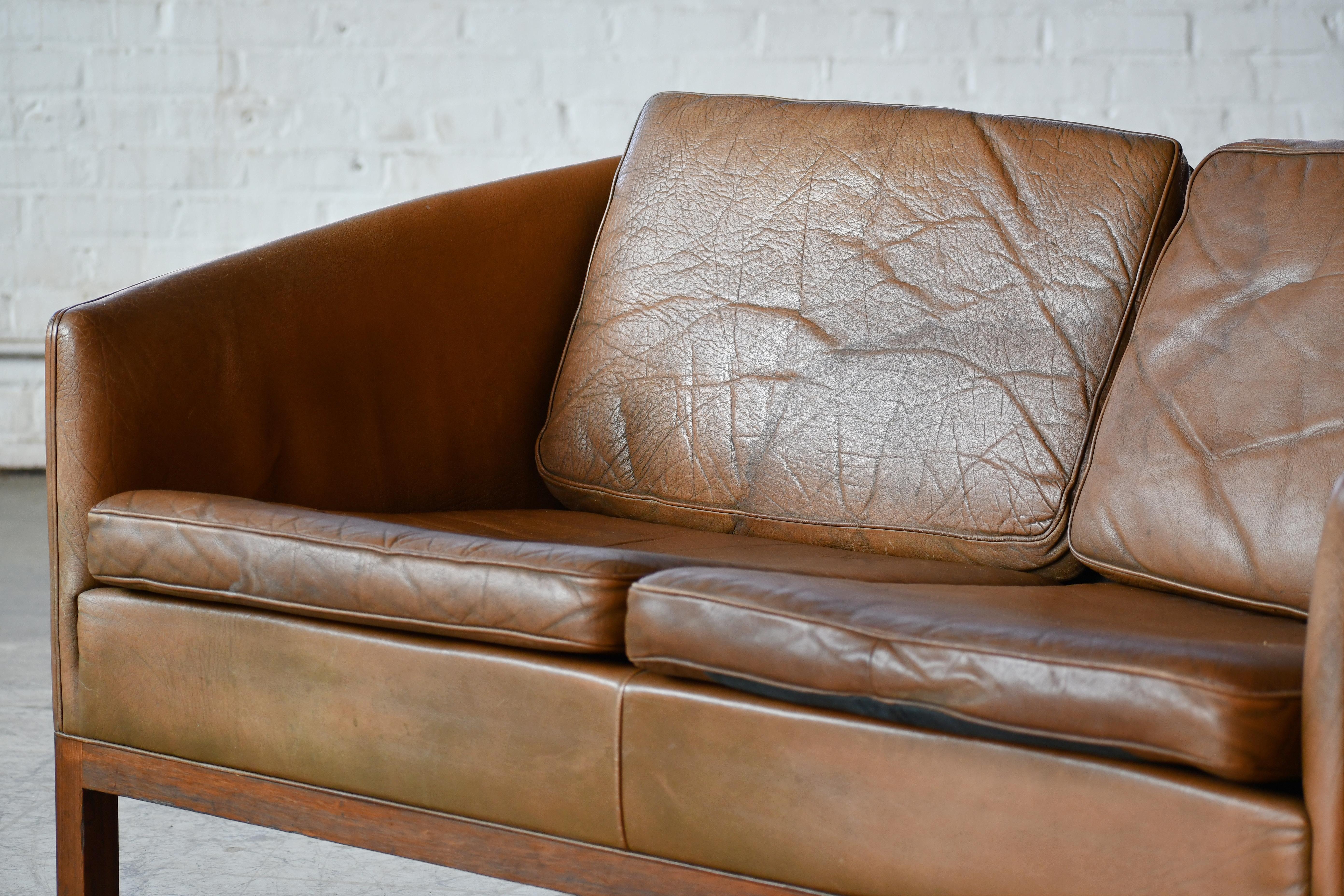 Danish Loveseat by Illum Wikkelso in Cognac Leather and Rosewood Denmark 1960's For Sale