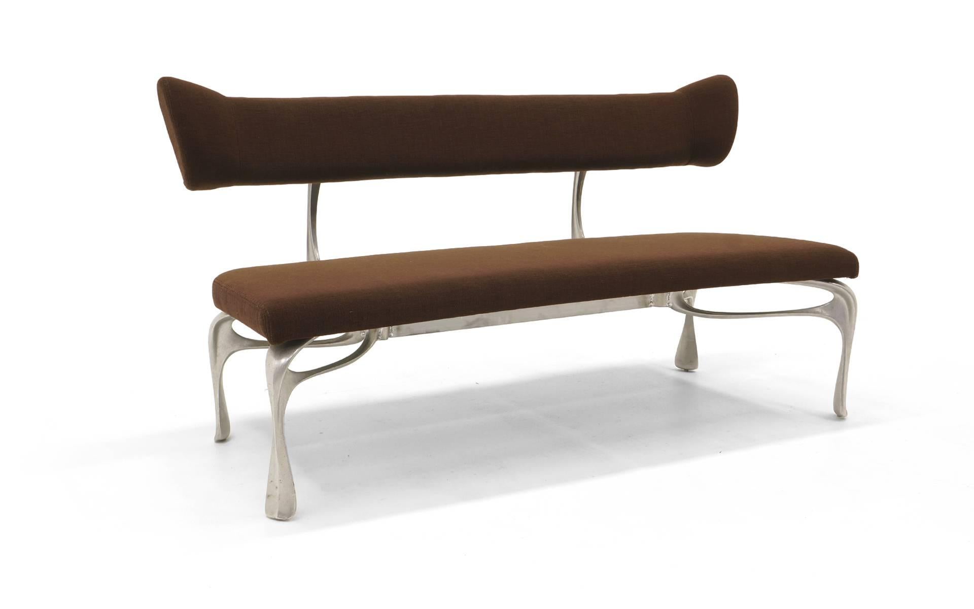 This small sofa / love seat / bench is a one of a kind prototype designed by Jordan Mozer, Chicago. This was never put into production due to high manufacturing costs. A rare opportunity to own a truly unique piece of sculptural modern design by