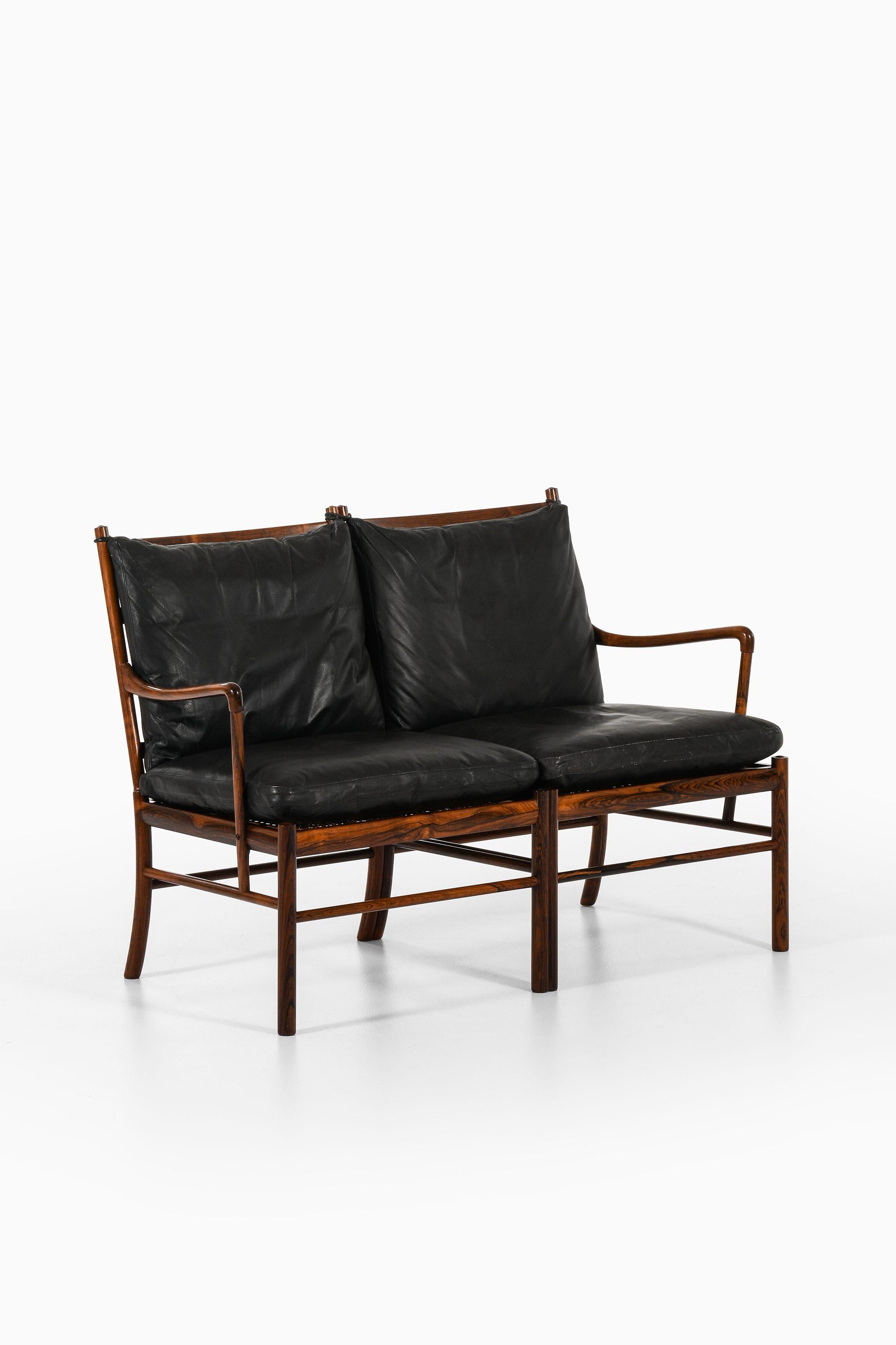 Loveseat Sofa in Rosewood, Woven Cane & Original Leather by Ole Wanscher, 1960's

Additional Information:
Material: Rosewood, woven cane and original leather
Style: Mid century, Scandinavia
Very rare loveseat sofa model Colonial
Produced by P.