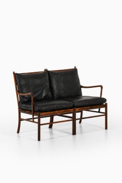 Canapé-lit en palissandre, rotin tressé et cuir d'origine par Ole Wanscher, années 1960