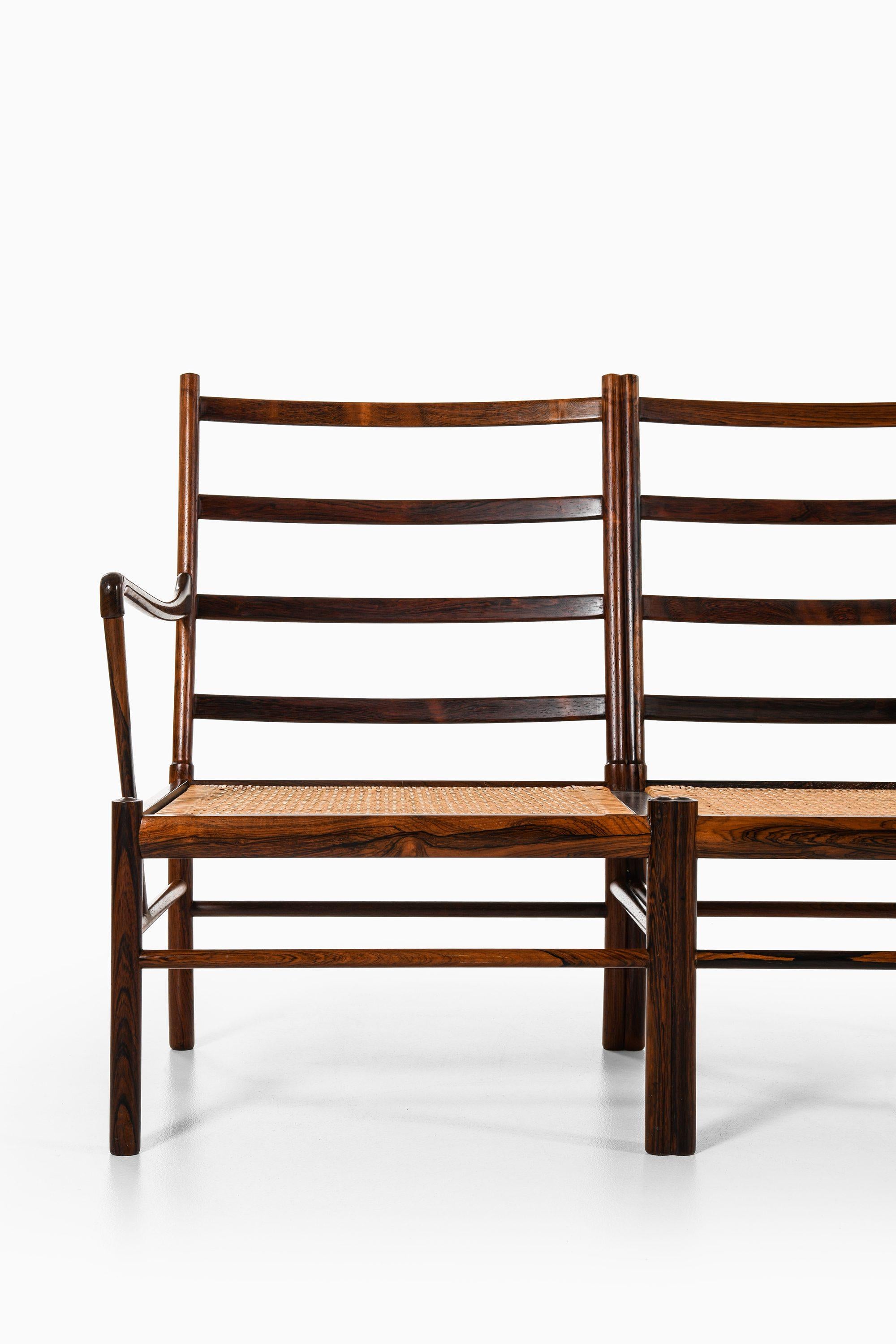 Loveseat Sofa in Rosewood, Woven Cane & Original Leather by Ole Wanscher, 1960's In Good Condition For Sale In Limhamn, Skåne län