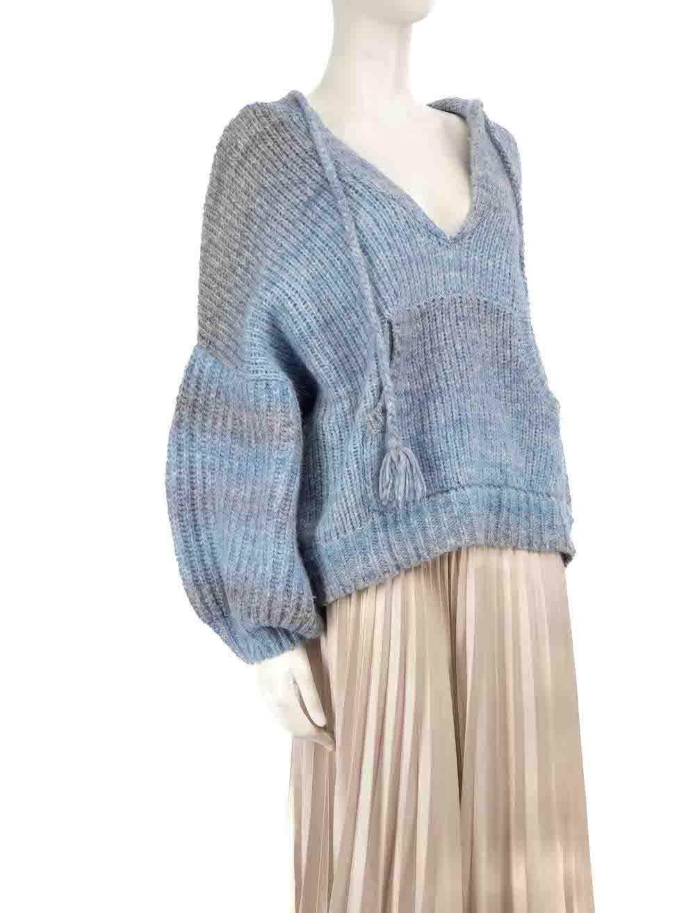 CONDITION is Very good. Hardly any visible wear to knitted hoodie is evident on this used LoveShackFancy designer resale item.
 
 Details
 Blue
 Wool
 Knit jumper
 Hooded
 V-neck
 Long sleeves
 Tassel detail
 
 
 Made in China
 
 Composition
 23%