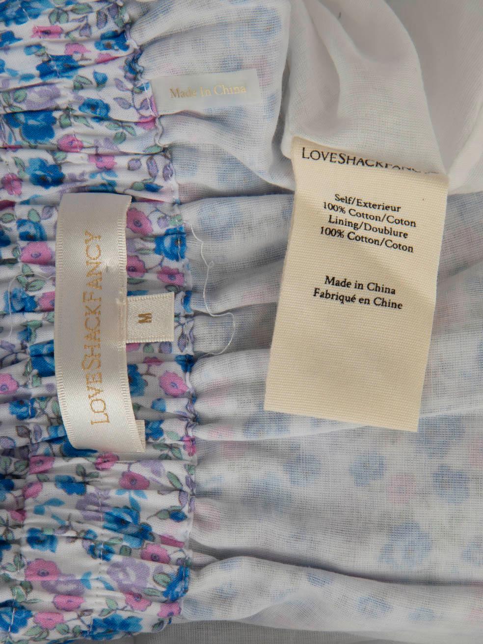 De las mujeres LoveShackFancy Minifalda con estampado floral en capas Talla M en venta