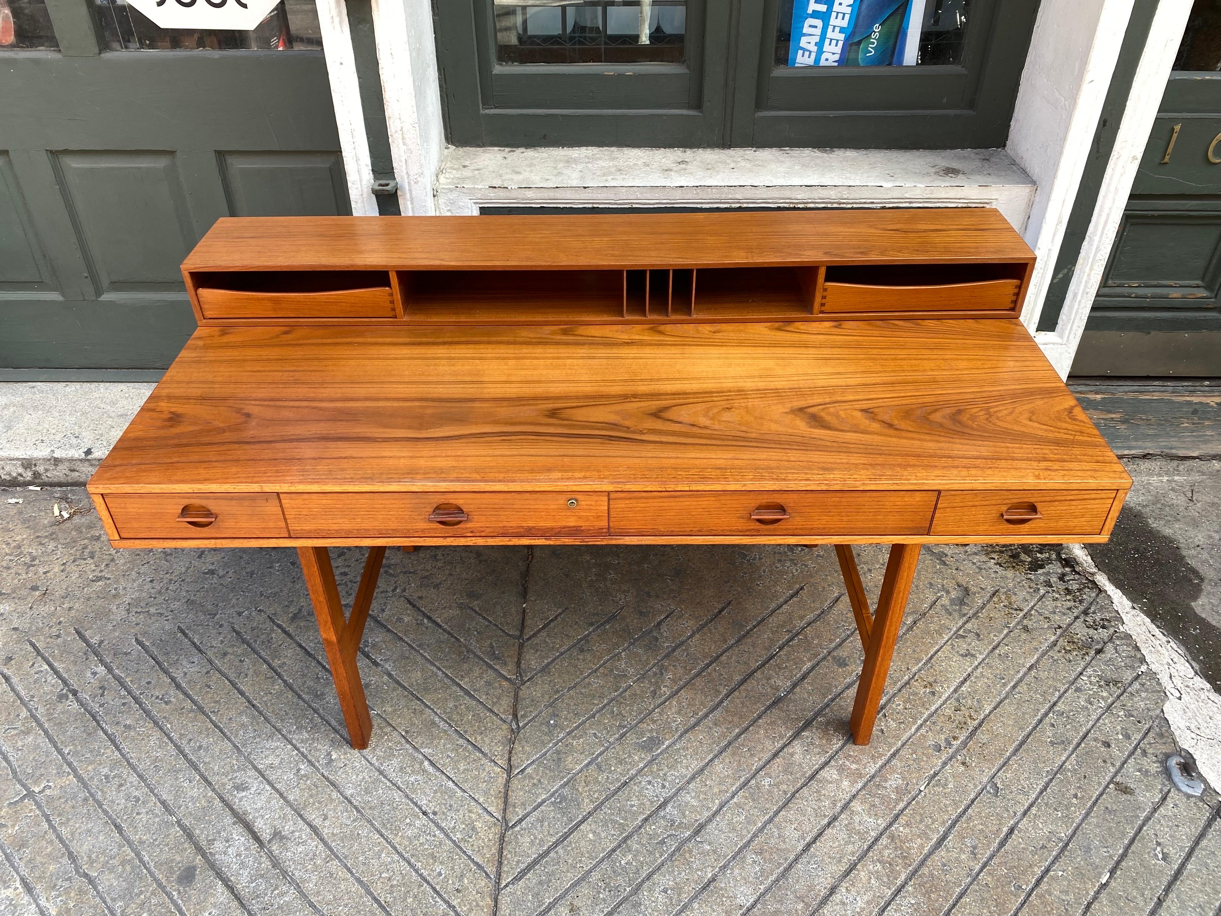 Lovig teak desk with cubby top that flips down to add another 9