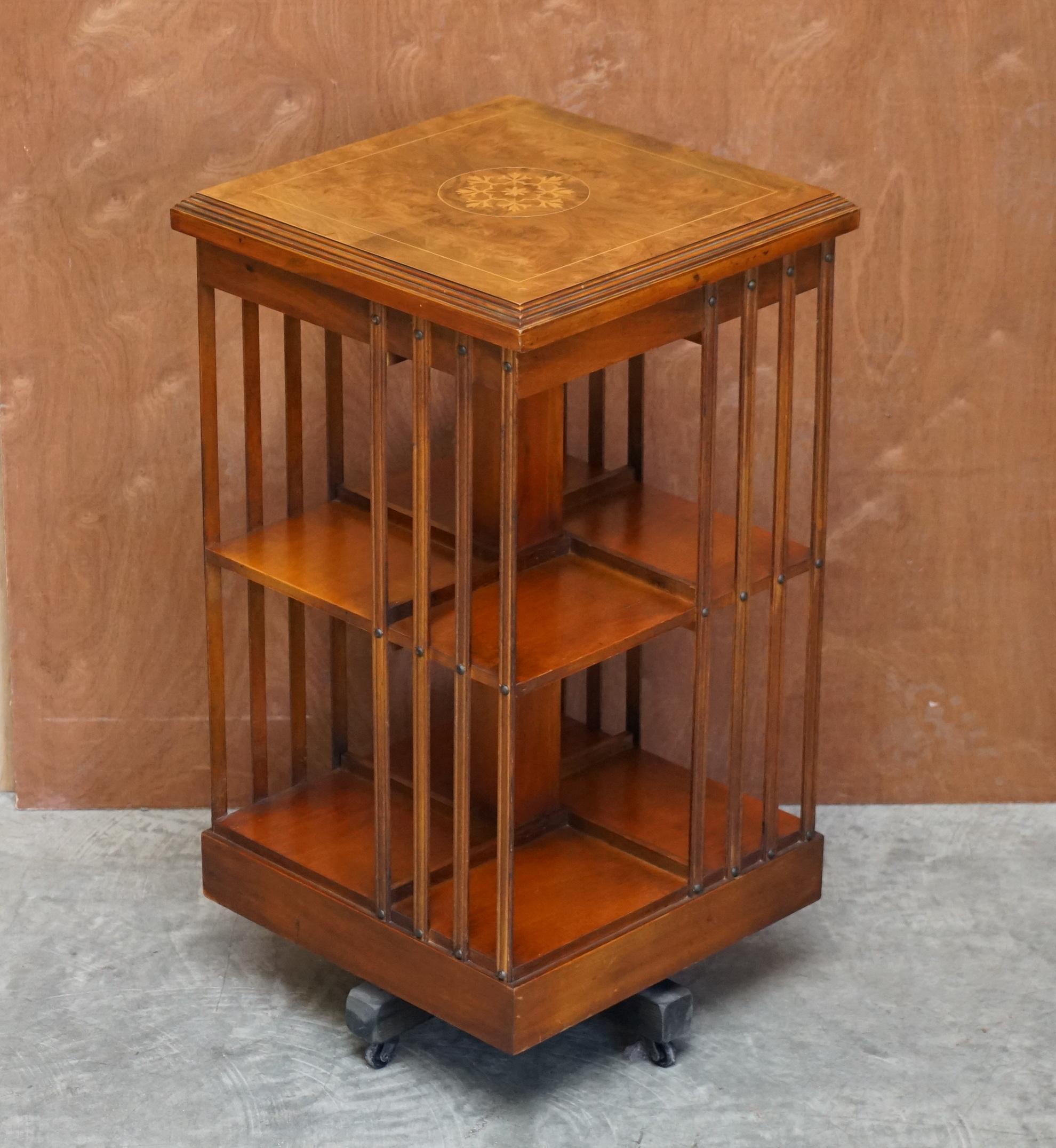 We are delighted to offer for sale this stunning vintage Sheraton revival burr elm & satinwood revolving bookcase table

A very good looking well made and decorative piece. Made in the Sheraton revival style with wonderful inlay and extremely