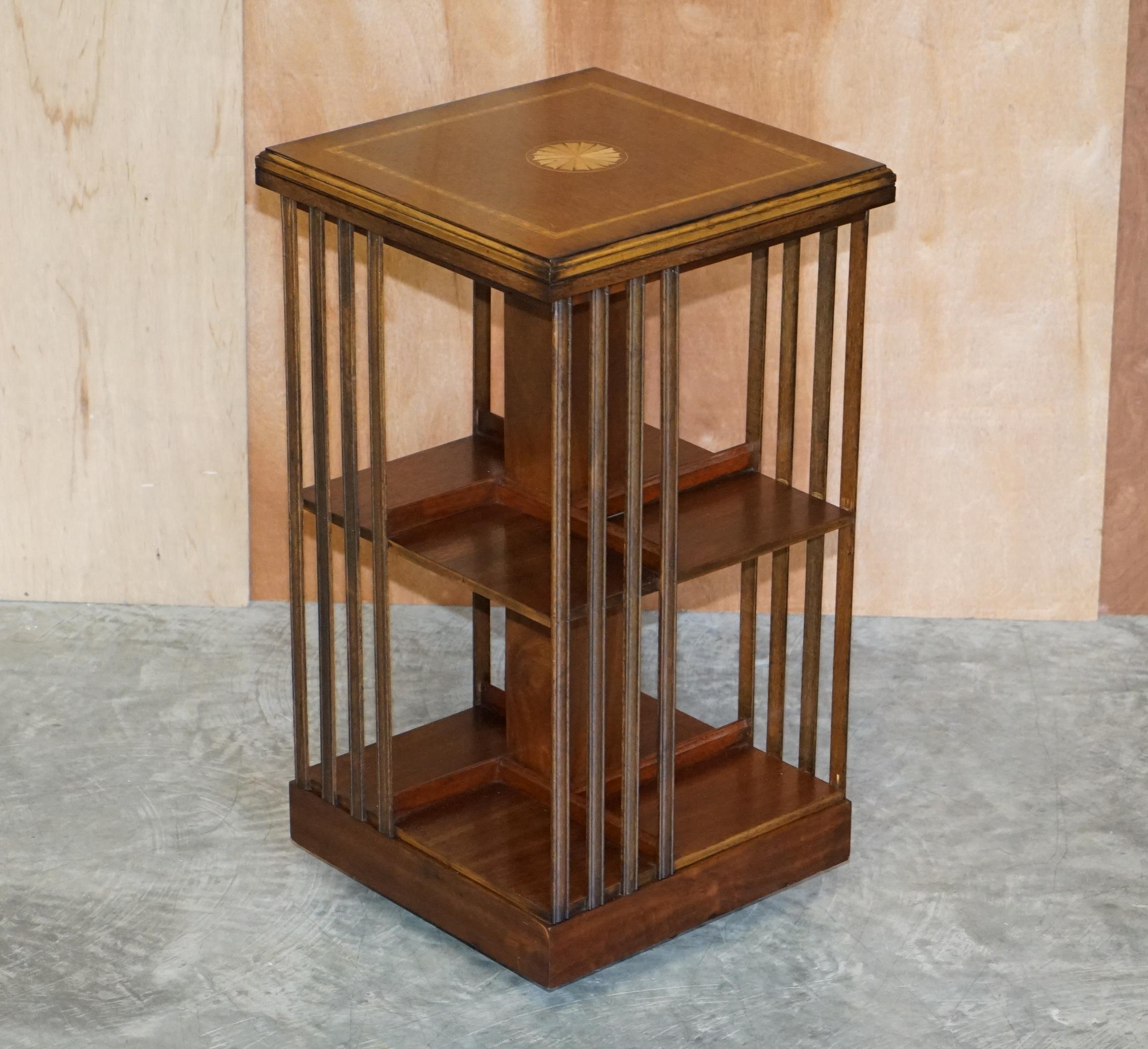 We are delighted to offer for sale this stunning vintage Sheraton Revival mahogany & Satinwood revolving bookcase table

A very good looking well made and decorative piece. Made in the Sheraton revival style with wonderful inlay and extremely