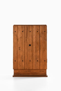 Armadio Lovö in ferro, pino e ferro battuto di Axel Einar Hjorth, anni '30