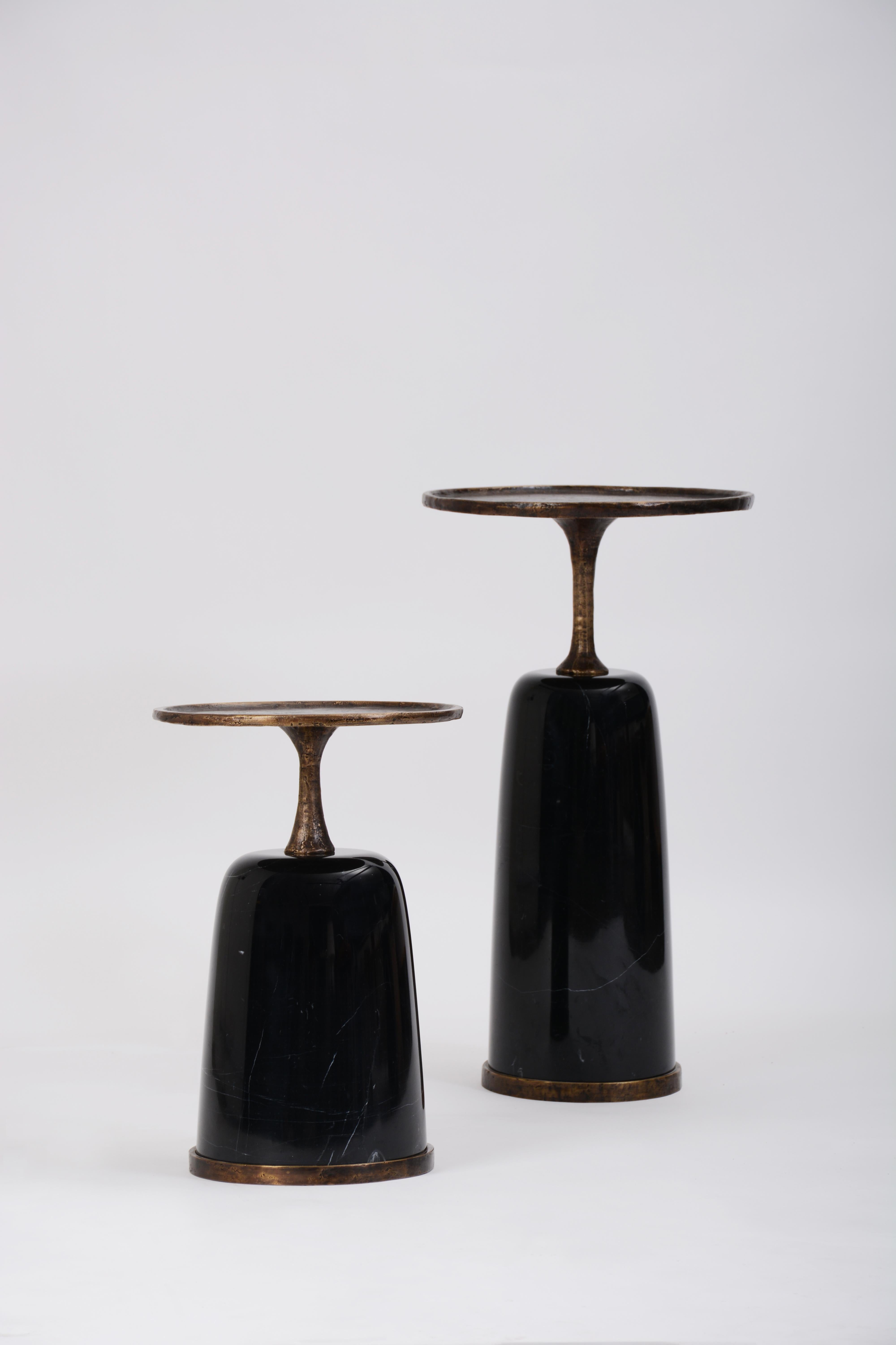 Low Altai Side Table in stock in California. Available in two sizes, tall and low, priced individually.

Sculptural quality lost-wax cast bronze top affixed to shapely marble base. The finish of the top is a textural antique gold bronze. The base is