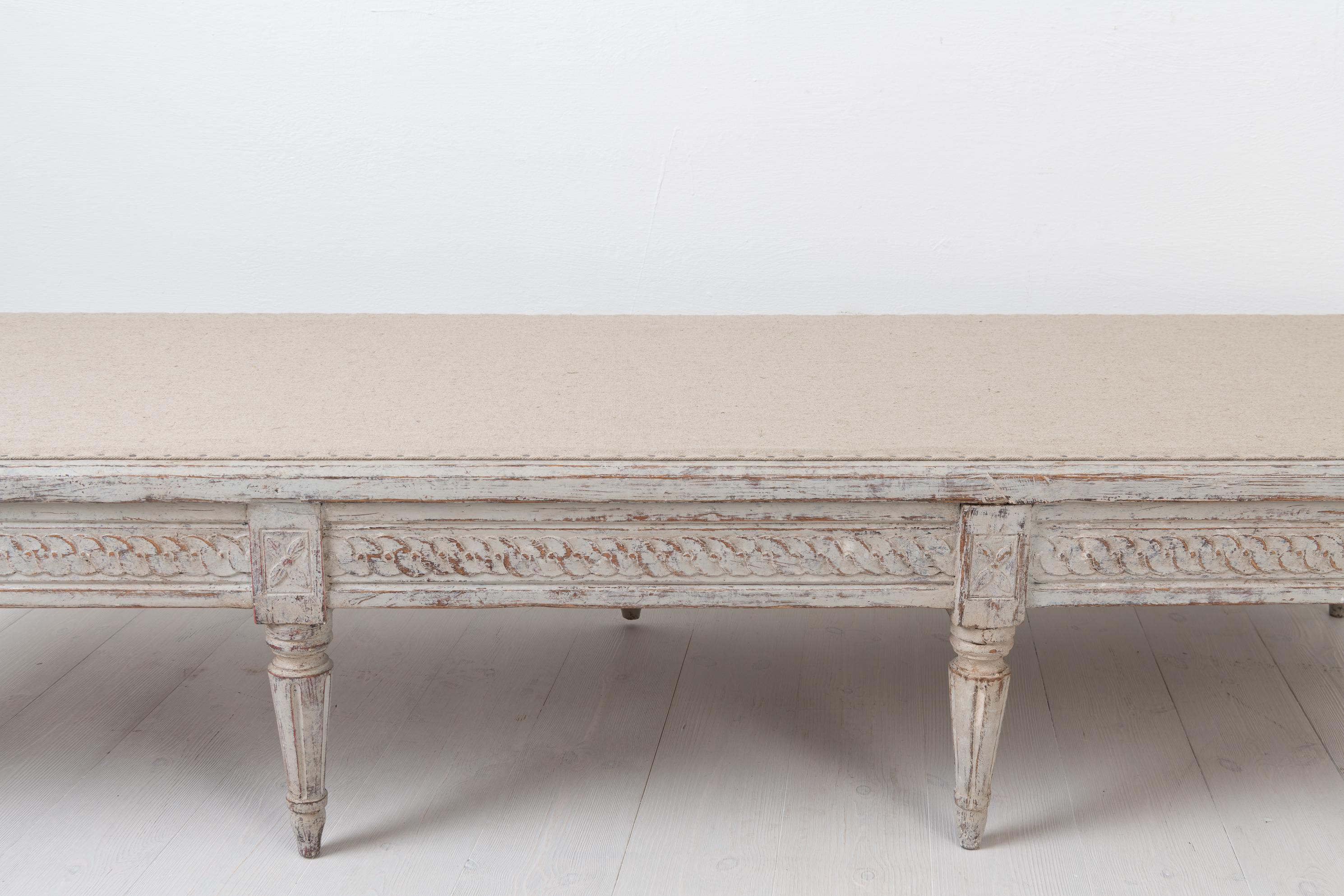 Low Antique Swedish Bench with White Distressed Paint 1