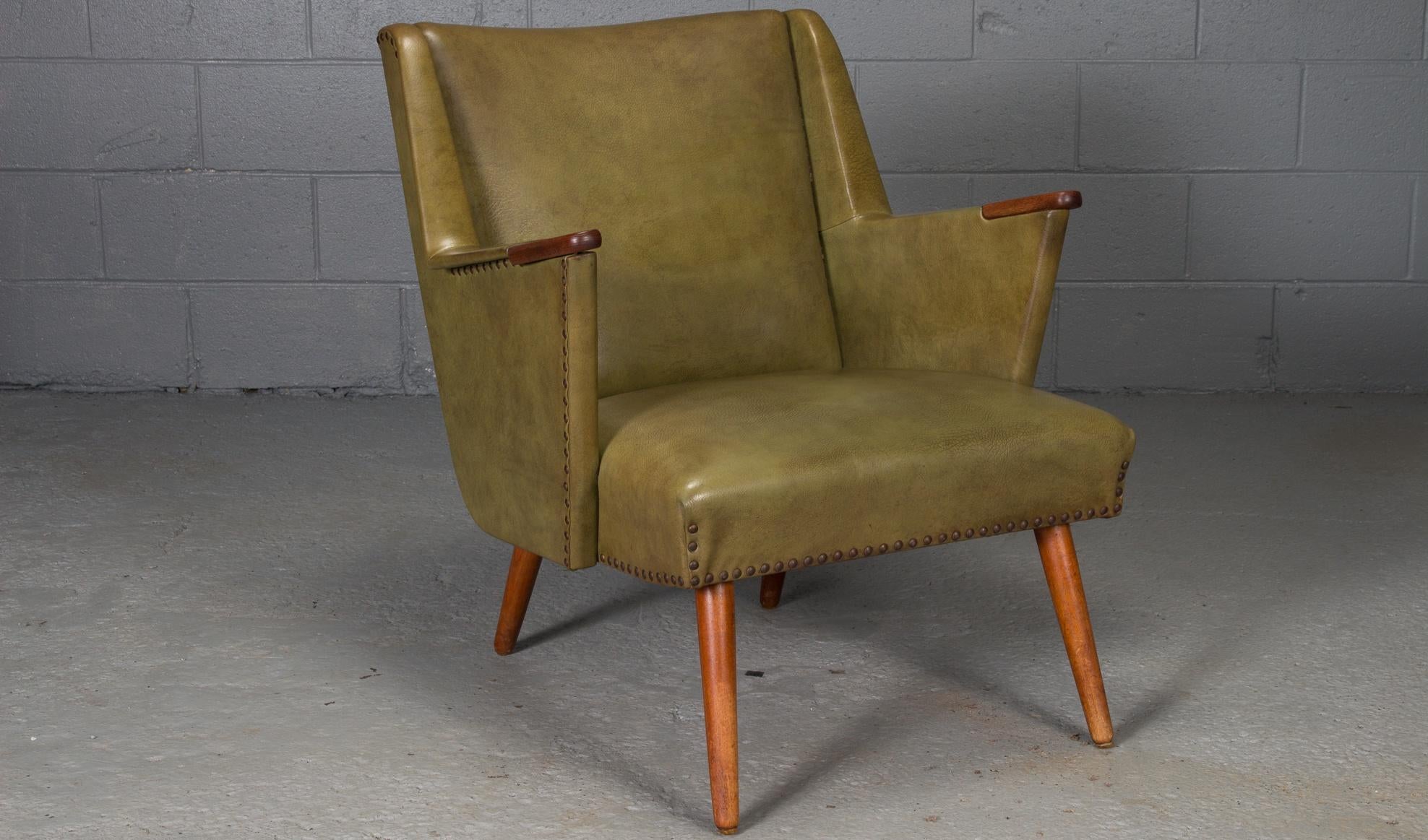 Danish Modern Lounge Chair with Nail Heads and Teak Legs and Paws. 