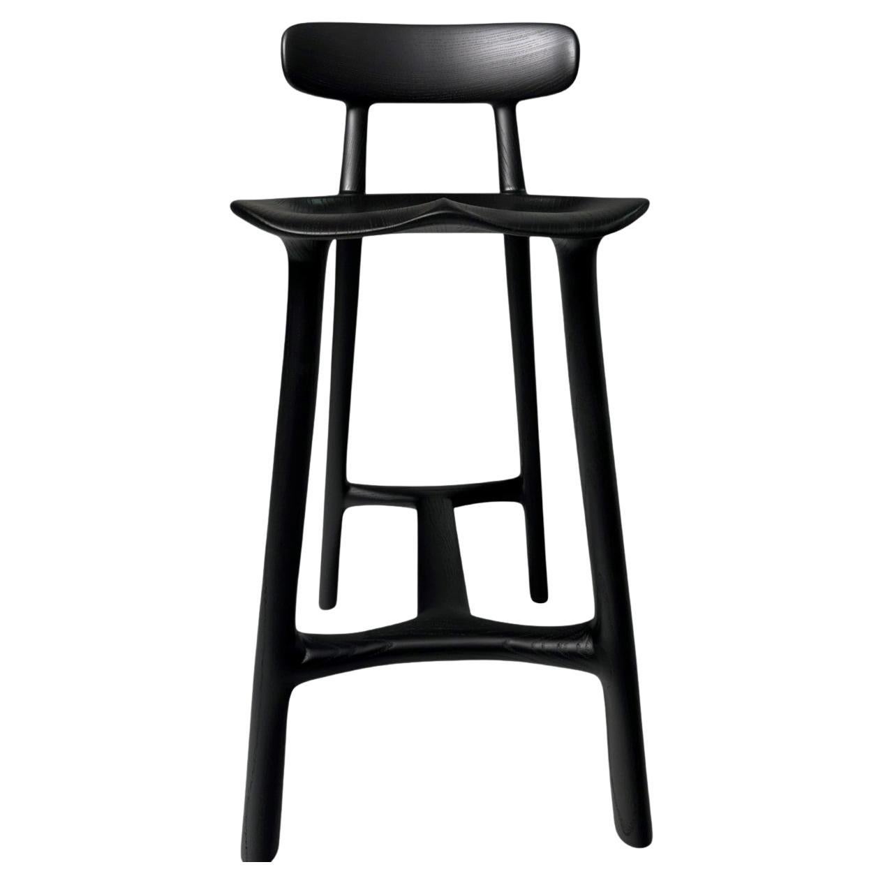 The Low Back Morphe Stool is an evolution of the original Naturalstated Fabricators Morphe Stool, retaining the original sculpted and form fitting elements while adding a backrest. The Low Back Morphe Stool combines form and function seamlessly. Its