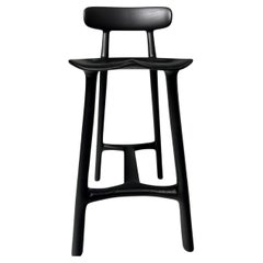 Tabouret Morphe à dossier bas en frêne noirci