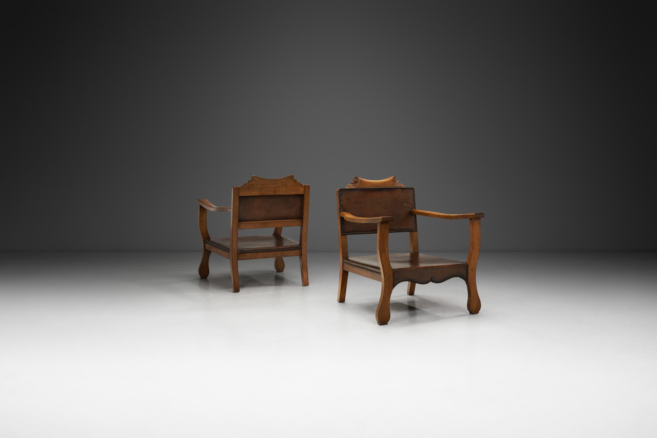 Questa coppia di poltrone del designer svedese-tedesco Otto Schulz è un bellissimo esempio del suo repertorio di pezzi sapientemente costruiti. Con una struttura in legno duro creativa e magistralmente realizzata e con la seduta e gli schienali