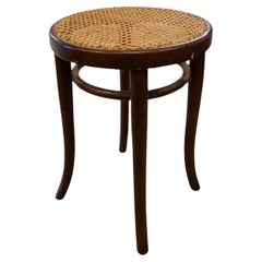Low bentwood stool with cane seat by Thonet, Austria 1920s