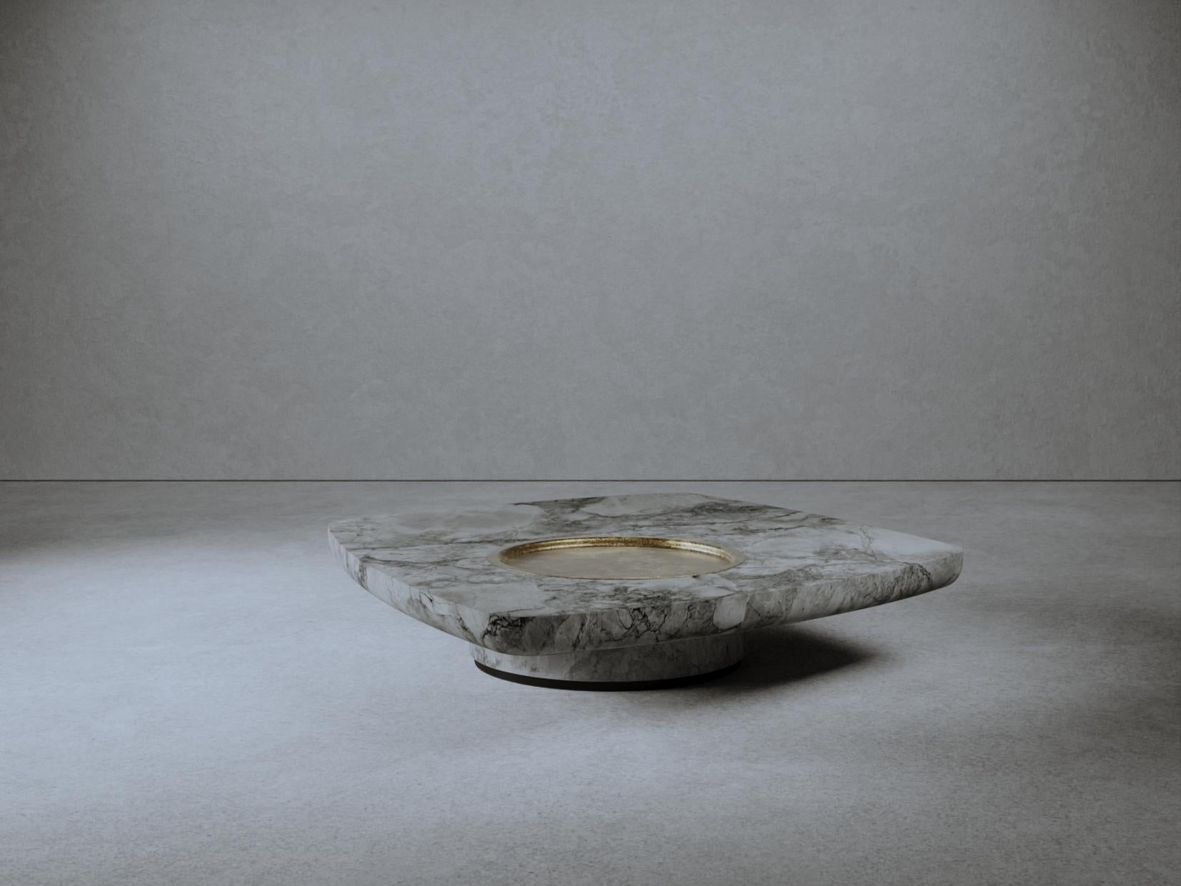 Low Blackbird Marble Coffee Table by Gio Pagani
Dimensions: D 120 x W 127 x H 26 cm.
Materials: Superwhite marble and raw brass metal tray.

In a fluid society capable of mixing infinite social and cultural varieties, the nostalgic search for