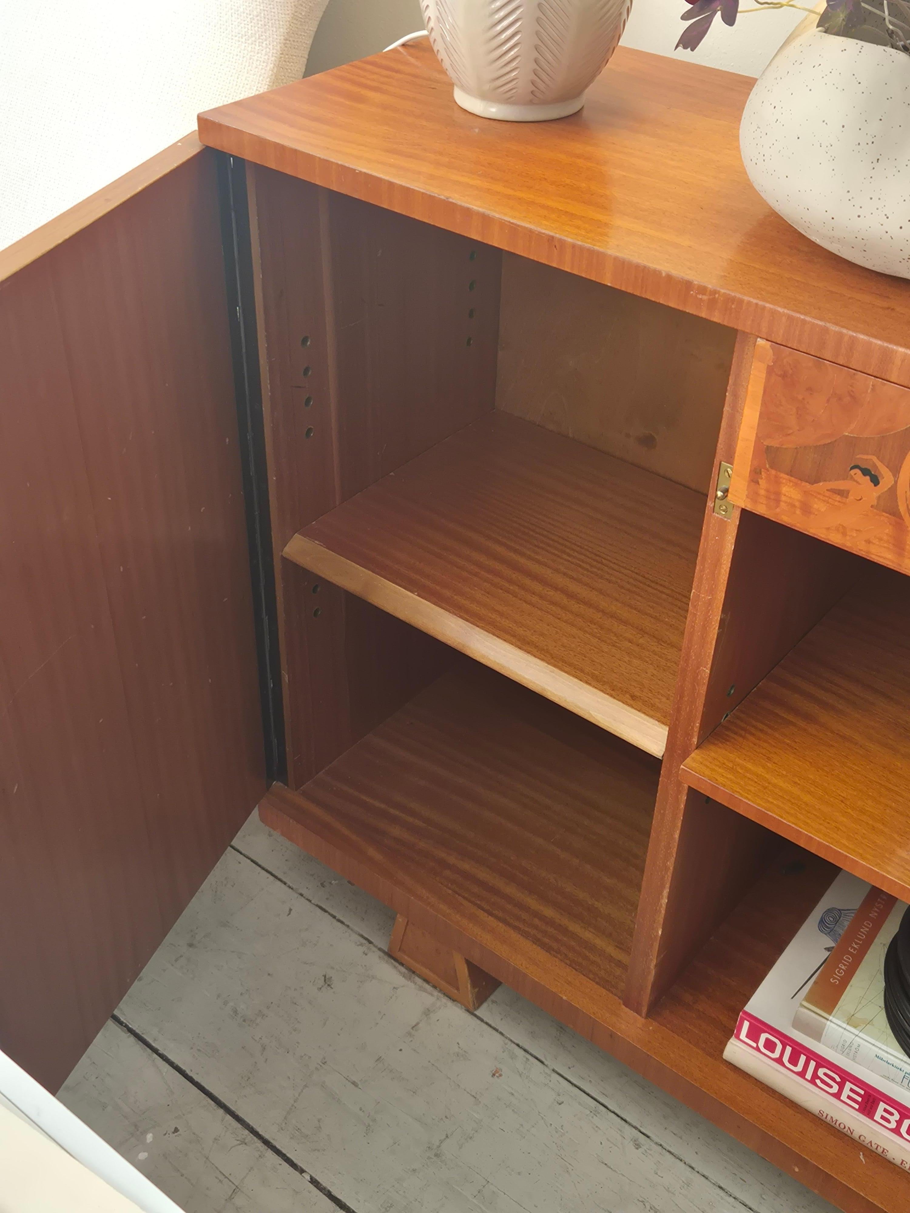 Low bookcase / sideboard with intarsia 