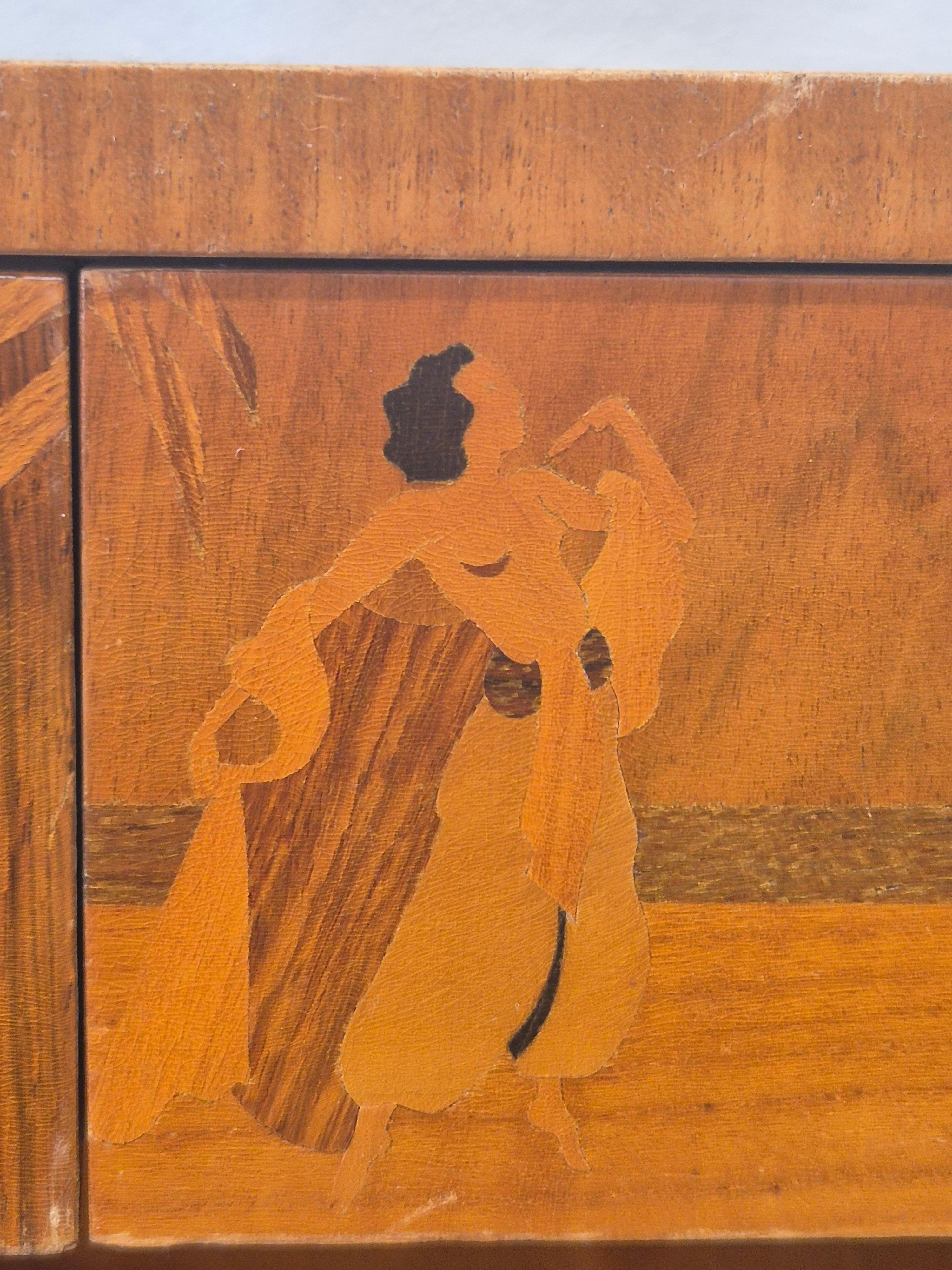 Low bookcase / sideboard with intarsia 