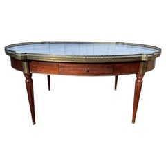 Low bouillotte table with ears, Louis XVI style
