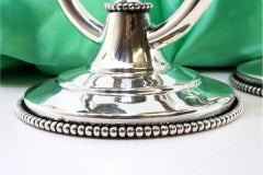 Low candelabras with two pearly lights and fluted bases