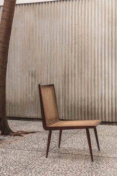 Low Chair by Joaquim Tenreiro