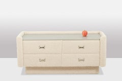 Low chest of drawers covered in fine looped fabric. 1970s. LS5925509F