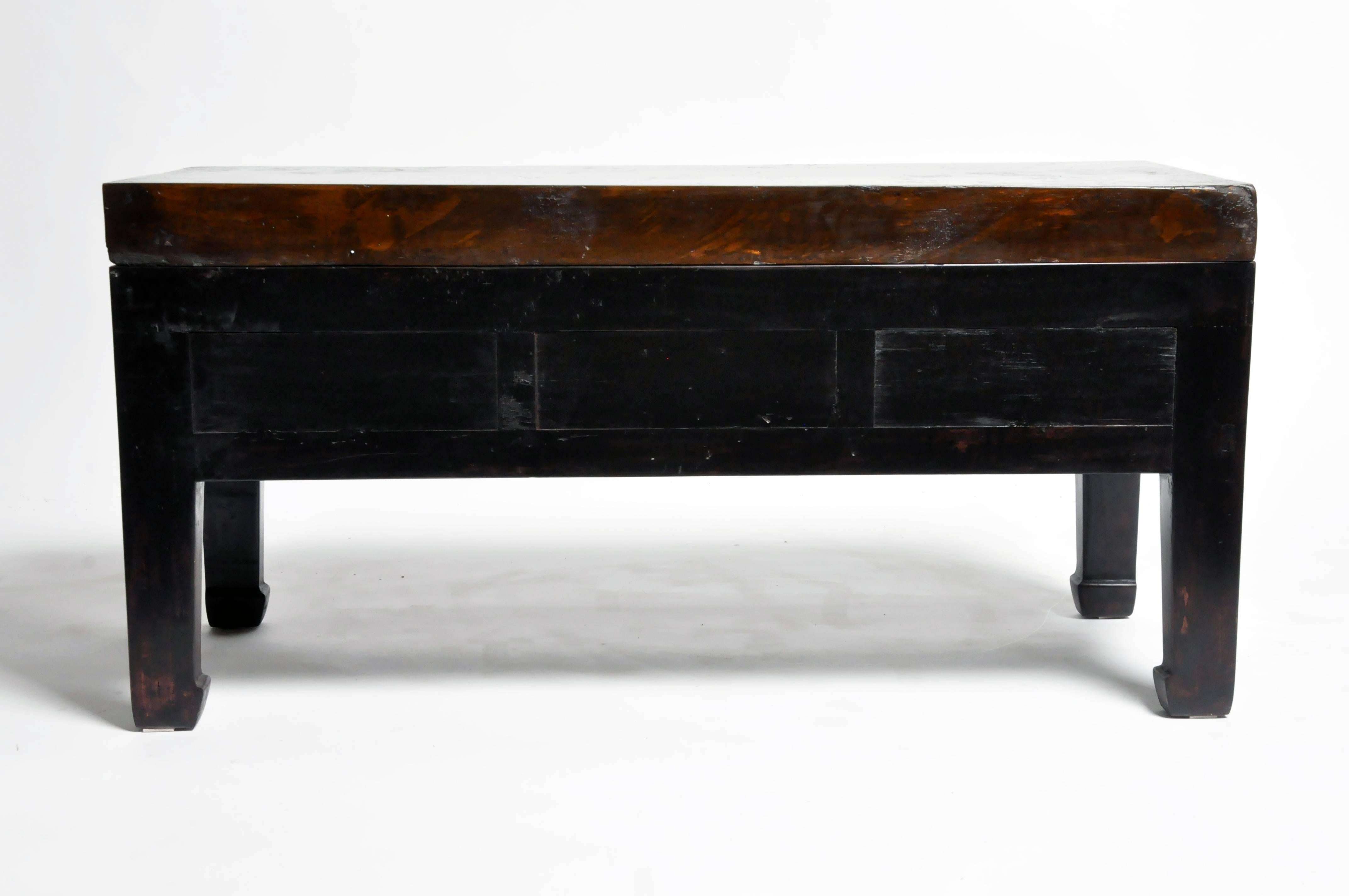 This handsome low table is from Jiangsu, China and was made from reclaimed elmwood and terracotta. The piece features mortise and Tenon joinery, three drawers, and a terracotta top. You can also customize it and make it your own. Wood, color,