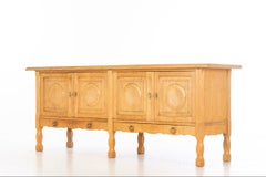 Low Credenza in Solid Carved Oak by Henning Kjærnulf 60's