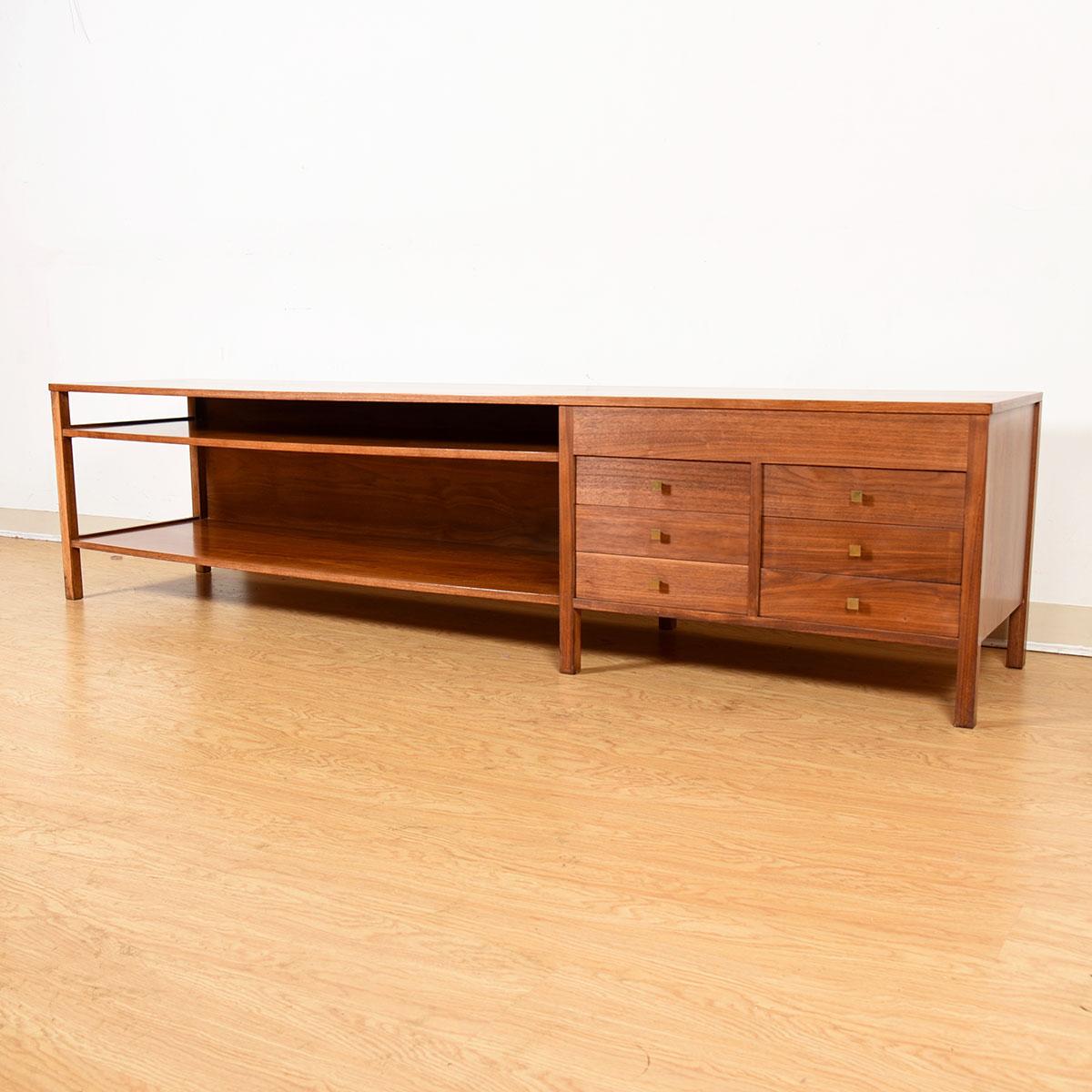 Rare Low Entertainment Console with Multifunctional Drawers/Accent Table by Paul McCobb, circa 1950s.

Additional information:
Featured at DC:
A custom creation by Paul McCobb circa 1950s. The four bottom ‘drawers’ flip over & expand to become