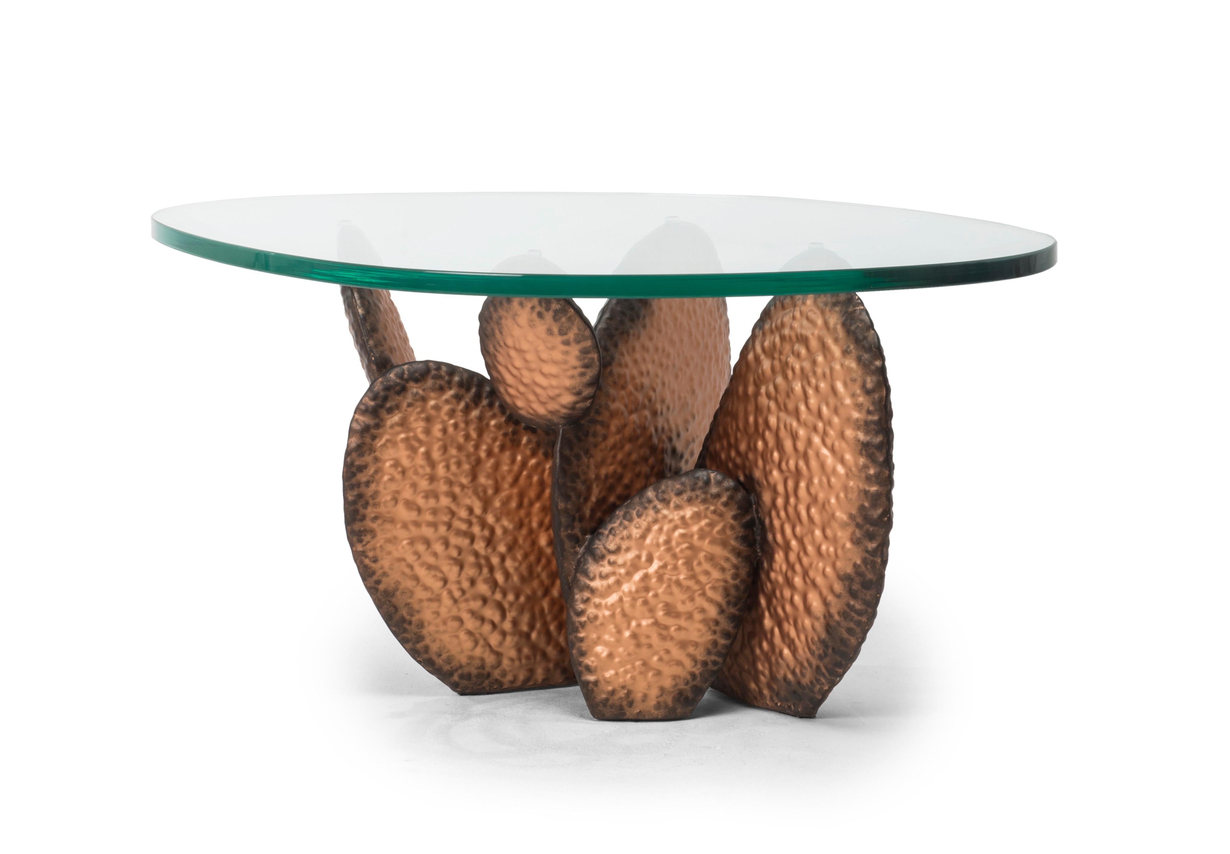 Low Gobi coffee table by Kenneth Cobonpue
Materials: Steel. Glass. 
Also available in other sizes.
Dimensions: 
Glass 85 cm x 59 cm x H 19mm 
Base 41.5 cm x 60 cm x H 39.5 cm

Inspired by the characteristic form of the cactus, Gobi is a