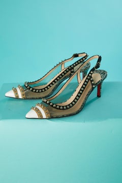 Low heels pump in PVC and pattern leather with studs Christian Louboutin