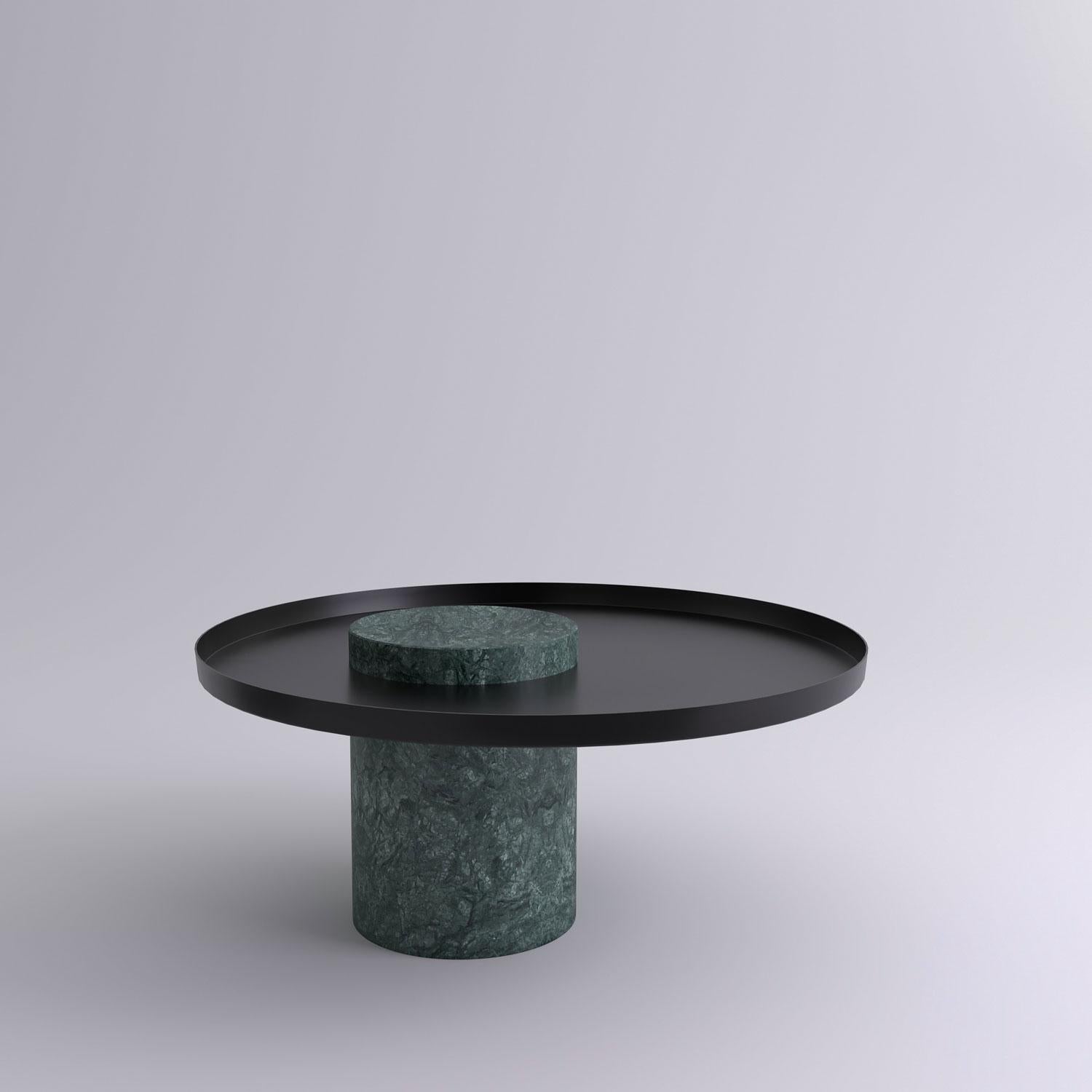 Low indian green marble contemporary guéridon, Sebastian Herkner
Dimensions: D 70 x H 33 cm
Materials: Indian Green marble, black metal tray

The salute table exists in 3 sizes, 4 different marble stones for the column and 5 different finishes for